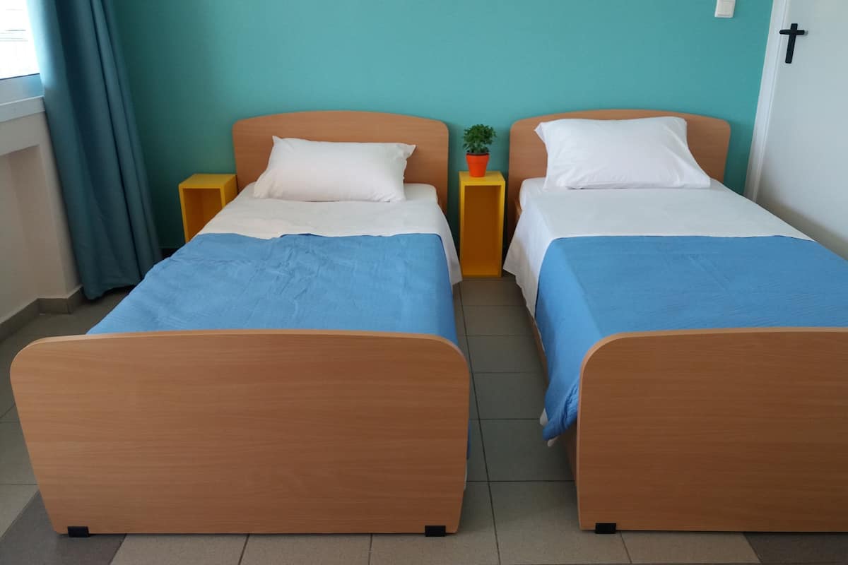 Blackout drapes, iron/ironing board, free WiFi, bed sheets