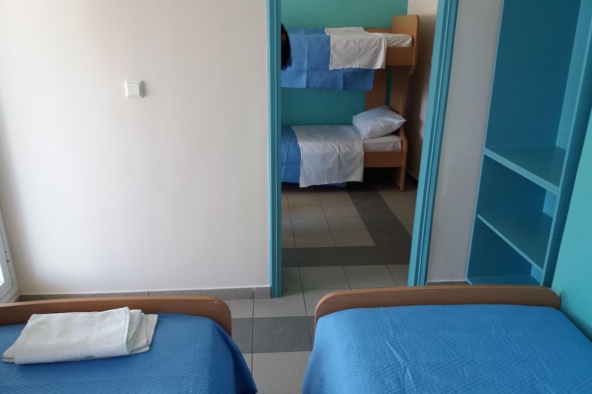 Blackout drapes, iron/ironing board, free WiFi, bed sheets