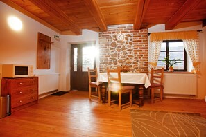 Duplex, Courtyard View | Living area | Flat-screen TV