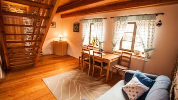 Duplex, Garden View | Living area | Flat-screen TV