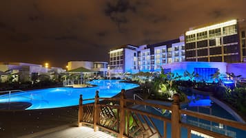 Indoor pool, outdoor pool, pool umbrellas, pool loungers