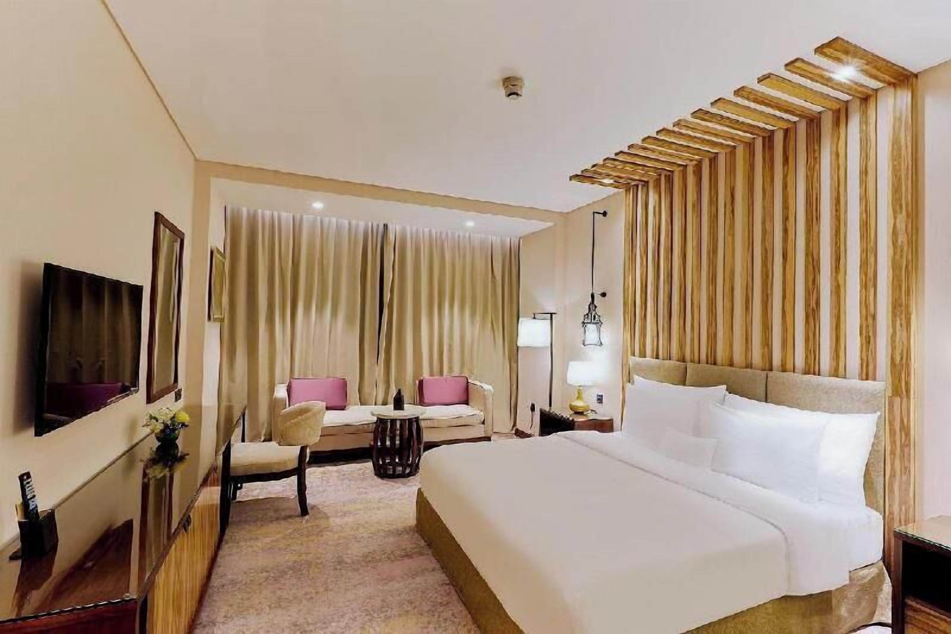 Egyptian cotton sheets, premium bedding, minibar, in-room safe