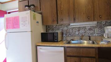 Condo, 2 Bedrooms | Private kitchen | Fridge, microwave, coffee/tea maker, cookware/dishes/utensils