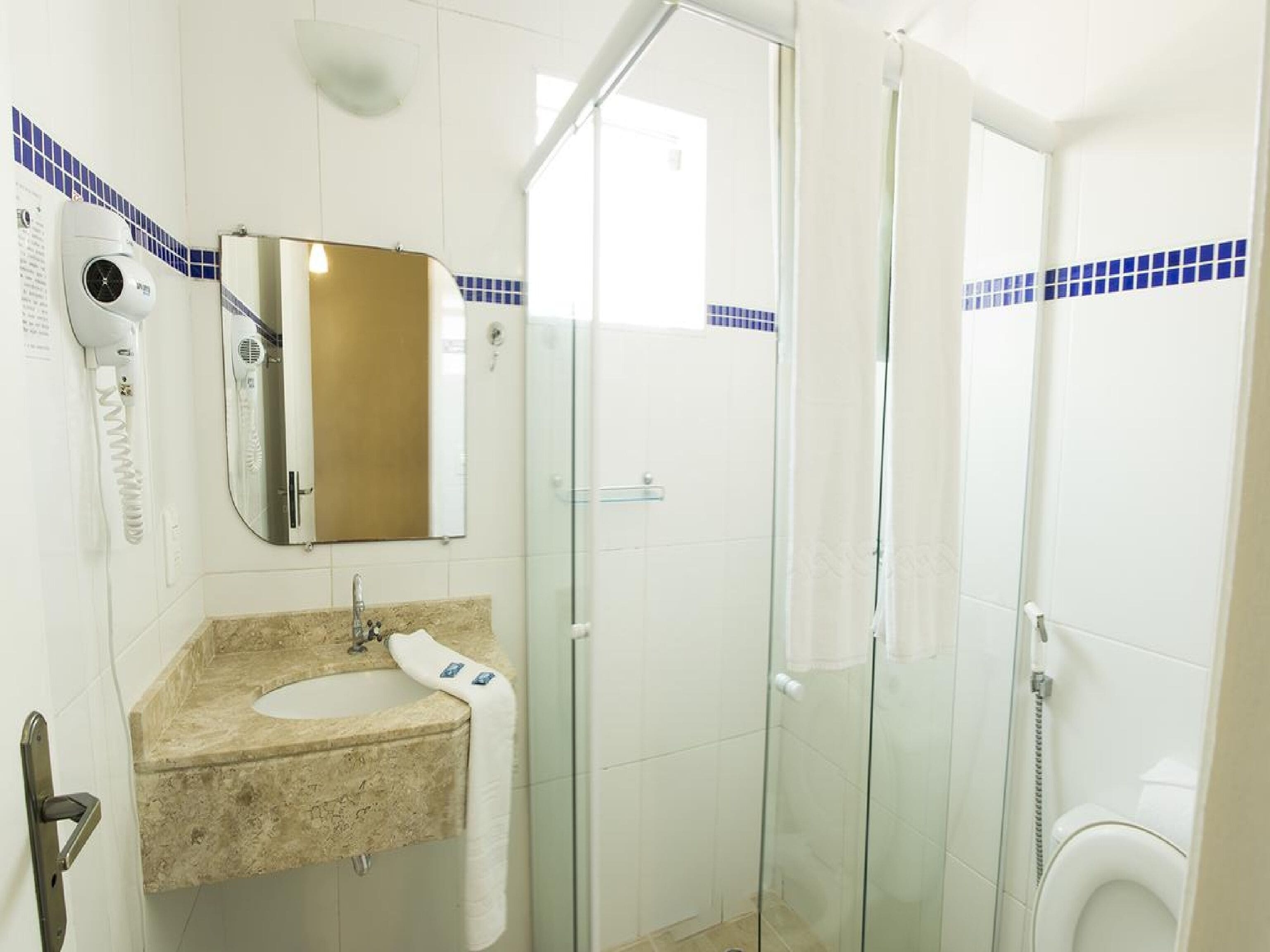 shower, free toiletries, hair dryer, towels