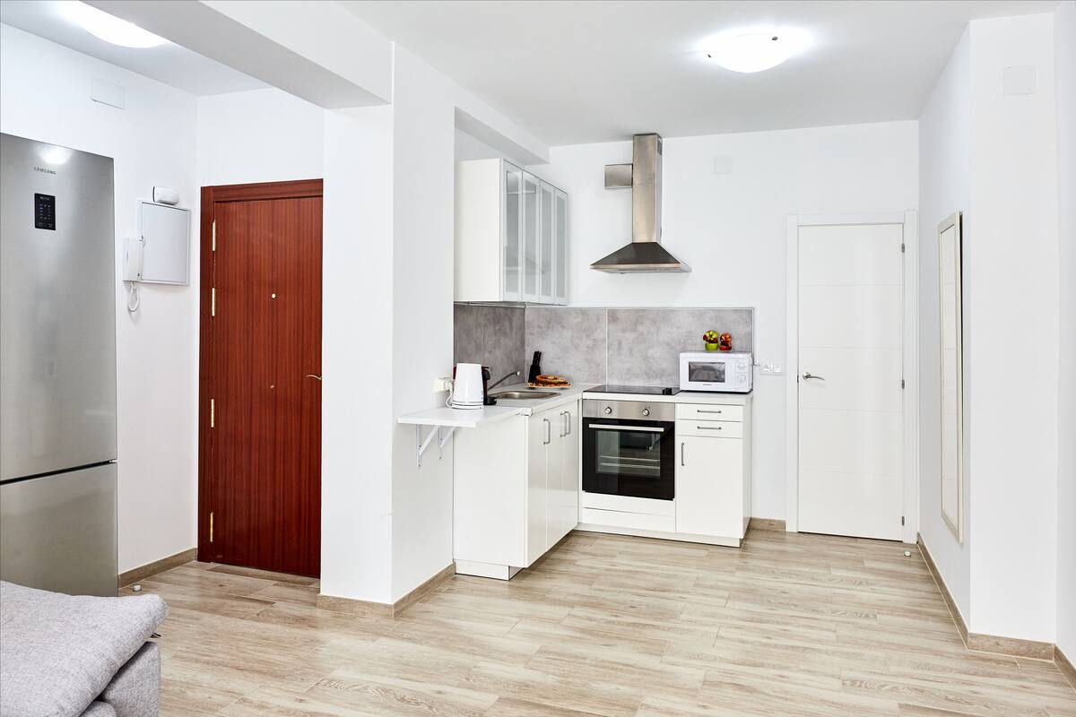 penthouse, sea view | private kitchen | full-sized fridge, microwave, oven, stovetop