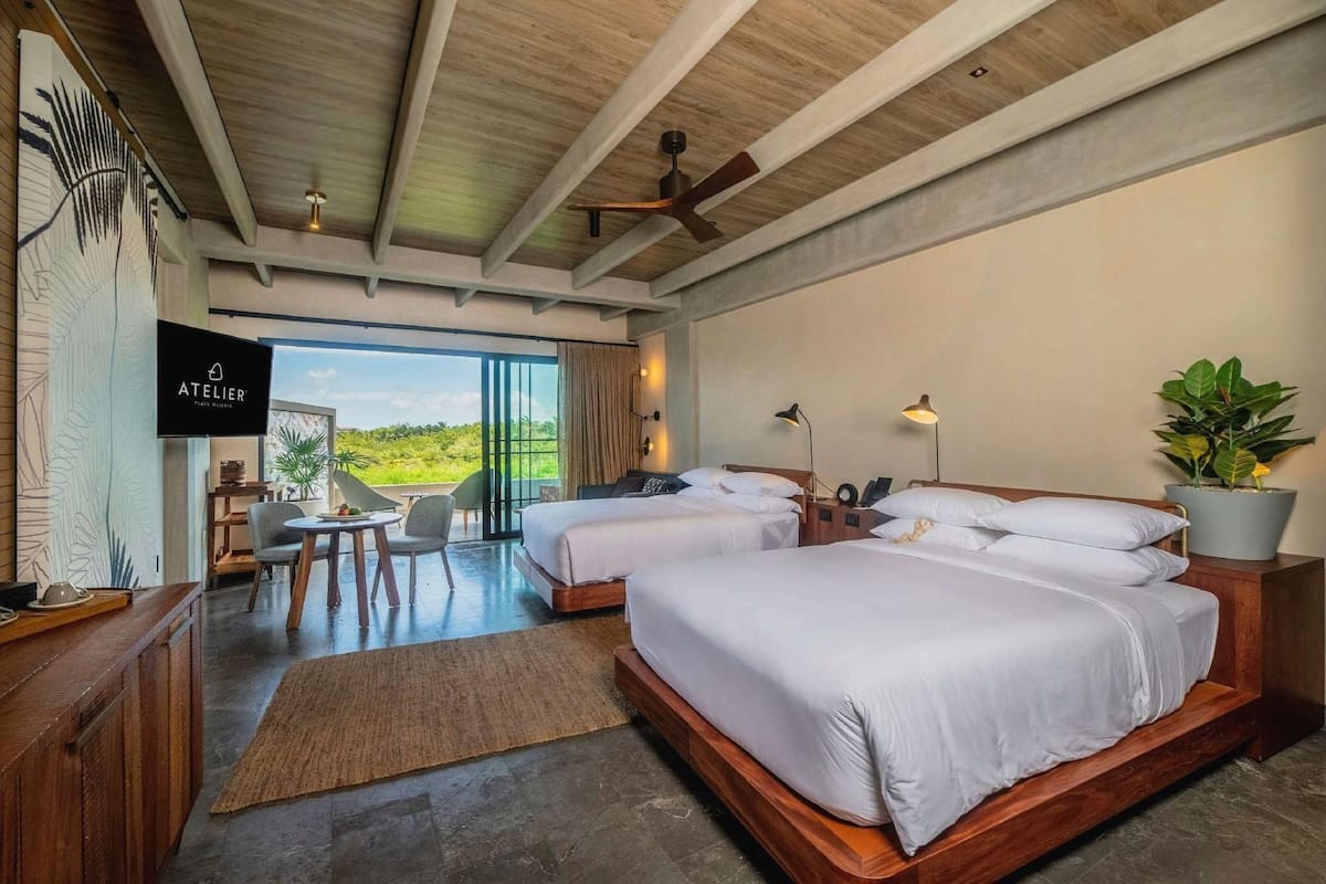 Premium bedding, down duvets, free minibar, in-room safe