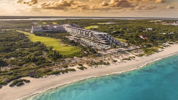 Enjoy stunning ocean views and beach access from this resort's rooftop pool area.