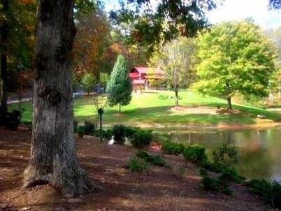 A authenic early American cabin located on a 85 acre farm in NC Foothills.