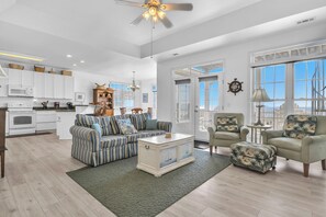 TV, fireplace, DVD player, books - Angel's Rest: Home with Ocean View and Marsh View Decks Plus Top Deck with Views (Oak Island)