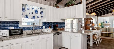 Dishwasher, coffee/tea maker, high chair, cookware/dishes/utensils