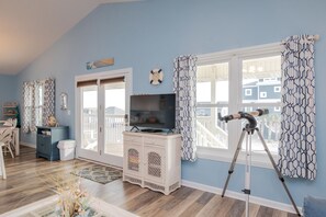 Televisión, reproductor de DVD y videoteca 