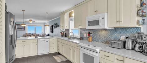 Fridge, dishwasher, coffee/tea maker, high chair