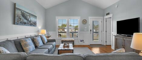 Televisión, reproductor de DVD, libros