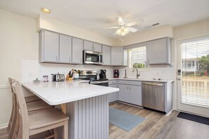 Fridge, microwave, oven, dishwasher - Pelican Palace: Beachwalk Home Centrally Located on Oak Island (Oak Island)