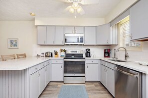Fridge, microwave, oven, dishwasher - Pelican Palace: Beachwalk Home Centrally Located on Oak Island (Oak Island)