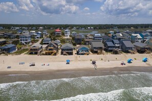 On the beach - Pelican Crossing: Oceanfront Home w/Spiral Staircase (Oak Island)