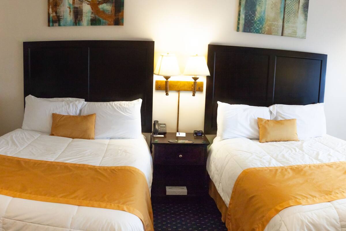 standard double room, 2 queen beds, non smoking | premium bedding, desk, blackout curtains, iron/ironing board