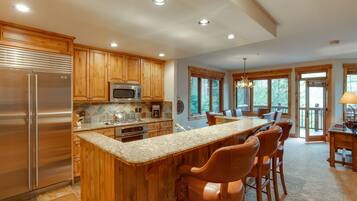 Standard Condo, 3 Bedrooms | Private kitchen | Coffee/tea maker, full-size fridge, microwave, oven