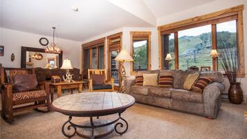 Standard Condo, 4 Bedrooms | Living area | 27-inch flat-screen TV with cable channels, TV, fireplace