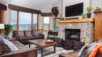 Standard Condo, 4 Bedrooms | Living area | 27-inch flat-screen TV with cable channels, TV, fireplace