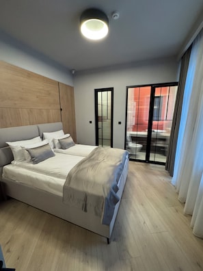Apartamento premium, 1 quarto, sacada | Lençóis italianos Frette, roupas de cama premium