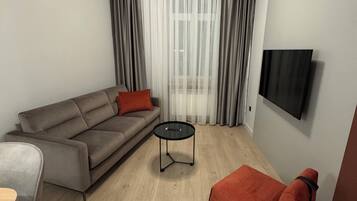 Luxury Apartment, 2 Bedrooms, Air conditioning, City View | Living area | Smart TV