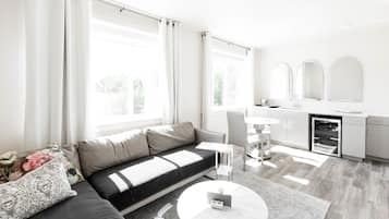 Suite Deluxe, 1 grand lit (Paris) | Coin séjour | Télévision à écran plat