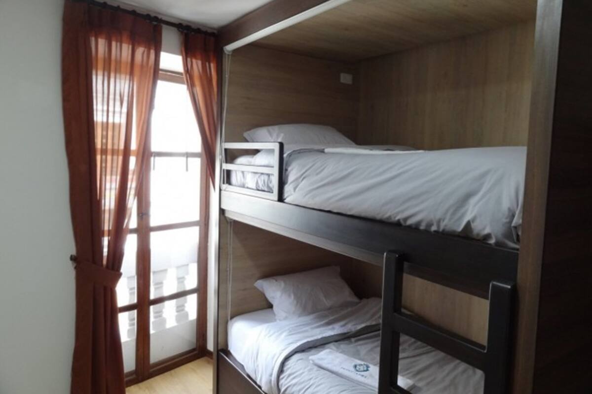 Premium bedding, down duvets, blackout curtains, free WiFi