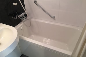 Shower, free toiletries, hair dryer, slippers