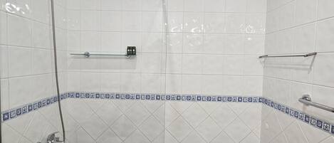 Bathtub, hair dryer, towels