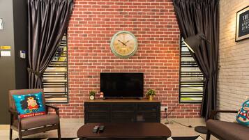 Basic House, Multiple Beds, Non Smoking | Living room | Flat-screen TV