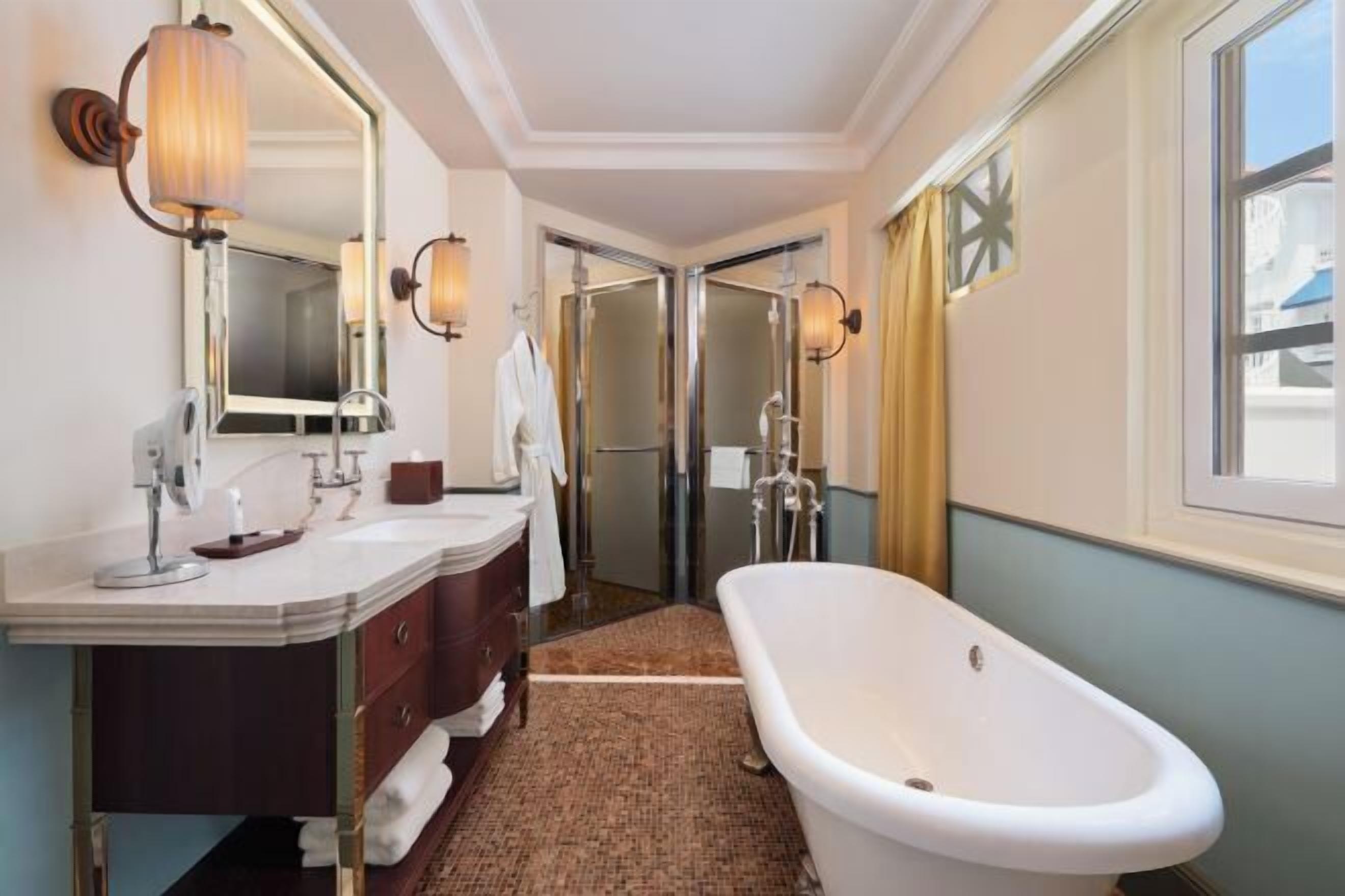 Bathroom | Shower, designer toiletries, hair dryer, bathrobes