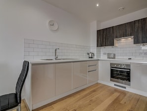 Full-sized fridge, microwave, coffee/tea maker, cookware/dishes/utensils