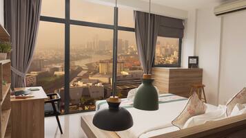 Suite ejecutiva, 1 cama de matrimonio grande | Ropa de cama de alta calidad, minibar, caja fuerte y escritorio