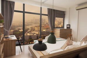 Executive Suite, 1 King Bed | Premium bedding, minibar, in-room safe, desk - The Snowbell Hotel & SPA @ The Bridge. (Phnom Penh)