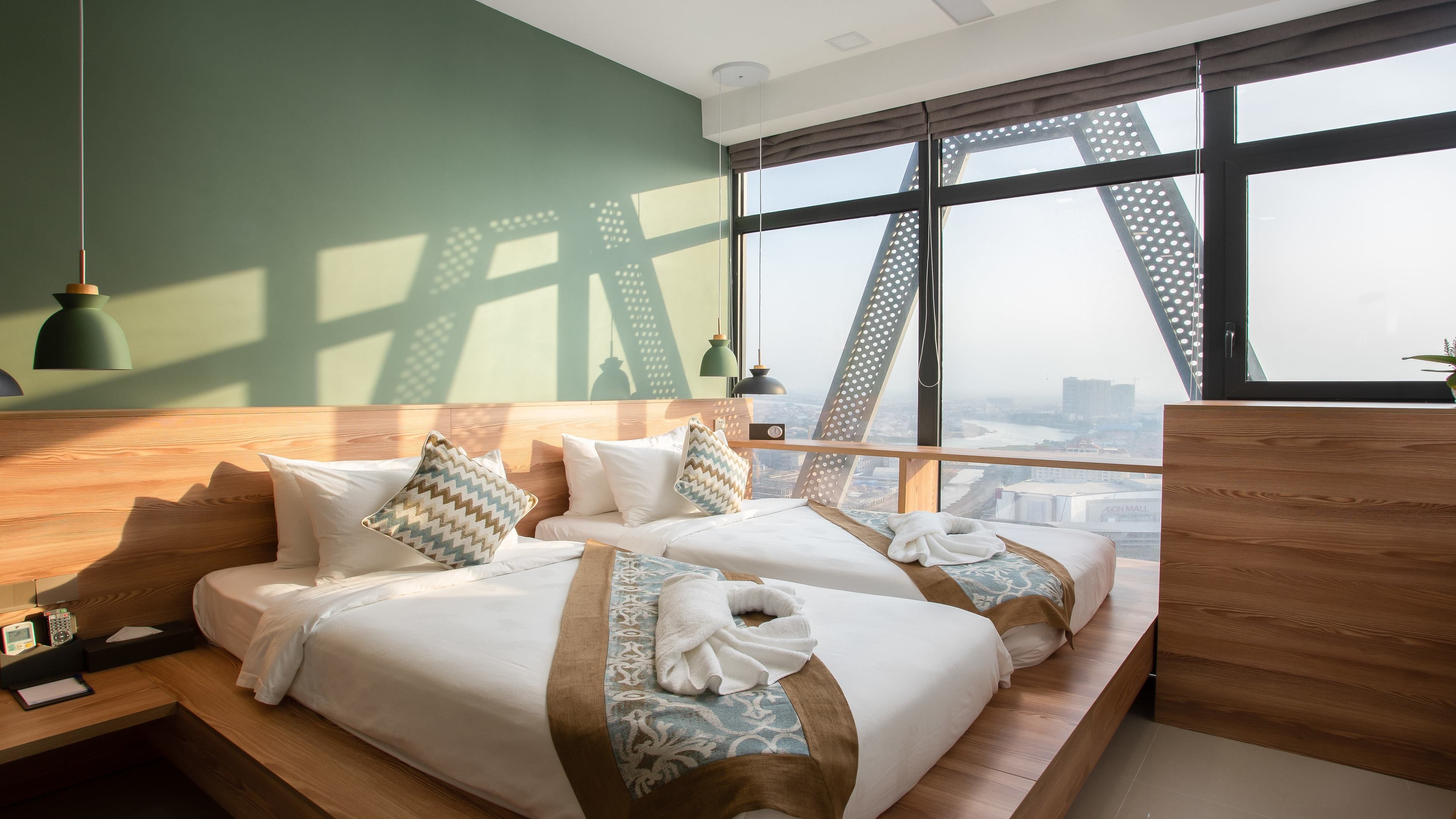 deluxe twin room, 1 bedroom, city view | 1 bedroom, premium bedding, minibar, in-room safe