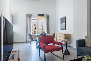 Apartamento | Zona de estar | Una televisión de pantalla plana