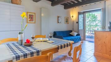 Apartment, 1 Bedroom | Living area | TV