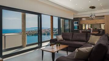 Biệt thự Cao cấp, hồ bơi riêng (Sapphire Pearl) | Phòng khách | TV màn hình phẳng