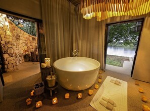 Luxury Suite | Bathroom | Separate tub and shower, deep soaking tub, rainfall showerhead