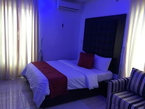 Blackout drapes, iron/ironing board, free WiFi, bed sheets