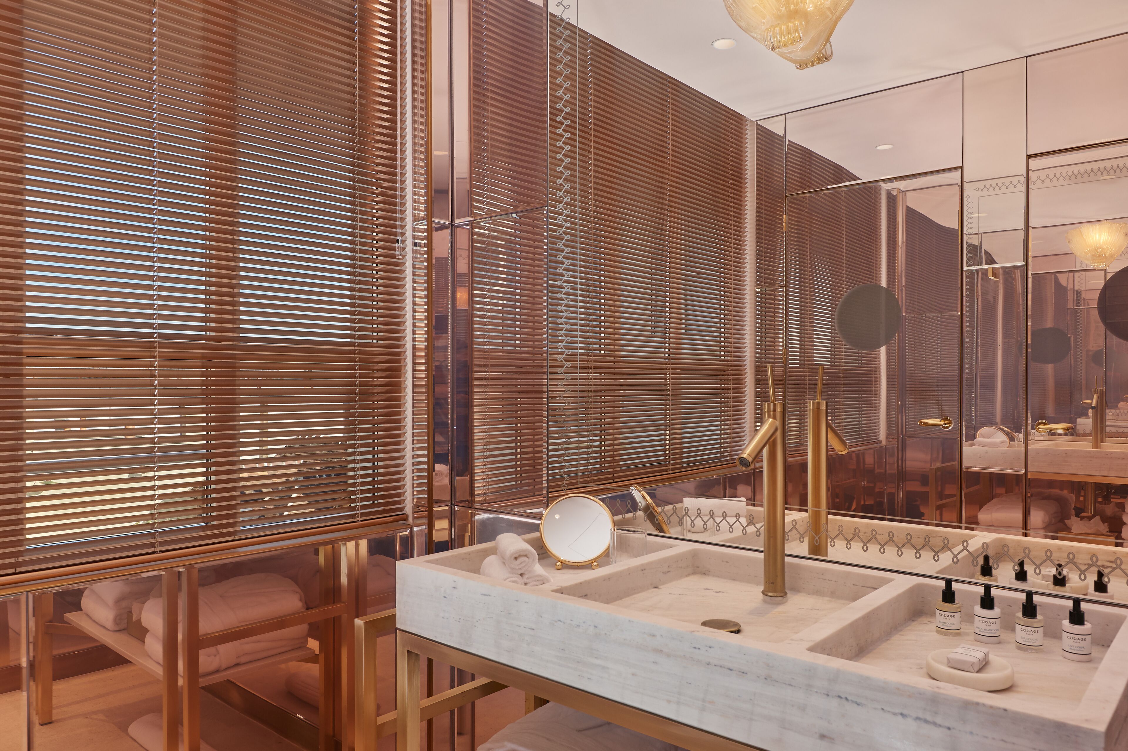 club double room | bathroom | designer toiletries, hair dryer, slippers, soap