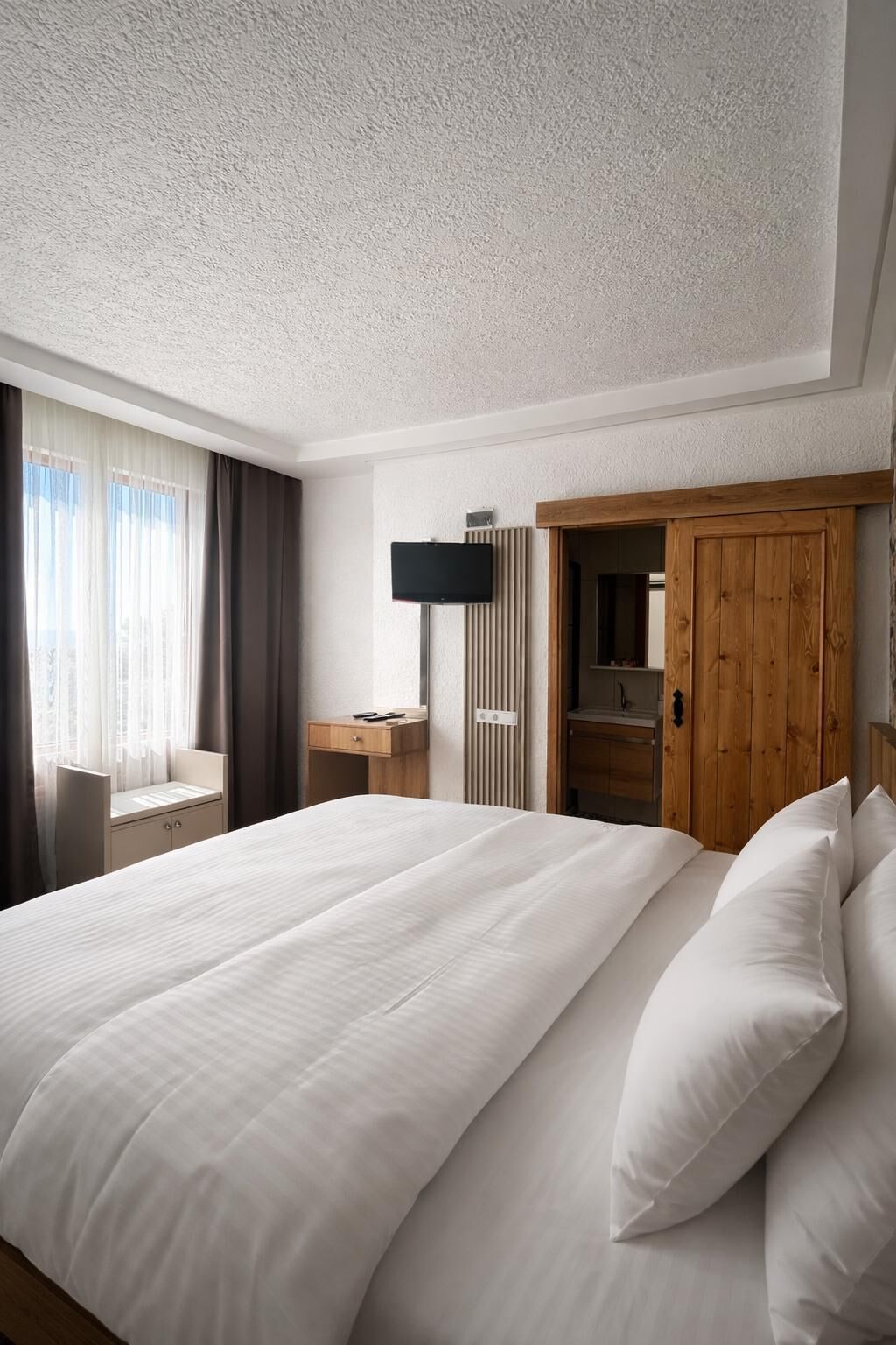 Habitación doble económica, 1 habitación, vista al mar | Escritorio, cortinas blackout, insonorización y wifi gratis 