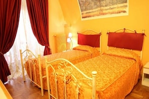 Luxe beddengoed, een kluis op de kamer, individueel gemeubileerd