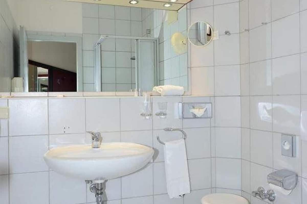 deep-soaking bathtub, free toiletries, hair dryer, slippers