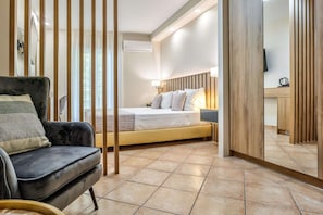 Superior Family Room with Land View | In-room safe, desk, soundproofing, iron/ironing board