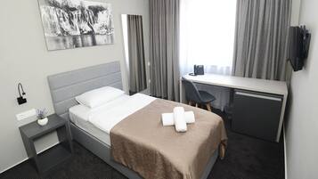 华丽单人房 | 迷你吧、客房内保险箱、办公桌、遮光窗帘