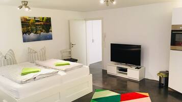 Apartment | Premium bedding, blackout curtains, free cots/infant beds, travel cot