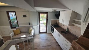 Family Duplex, 1 Bedroom | Private kitchen | Full-size fridge, microwave, oven, stovetop
