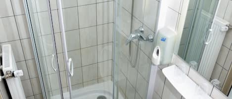 Shower, free toiletries, hair dryer, towels